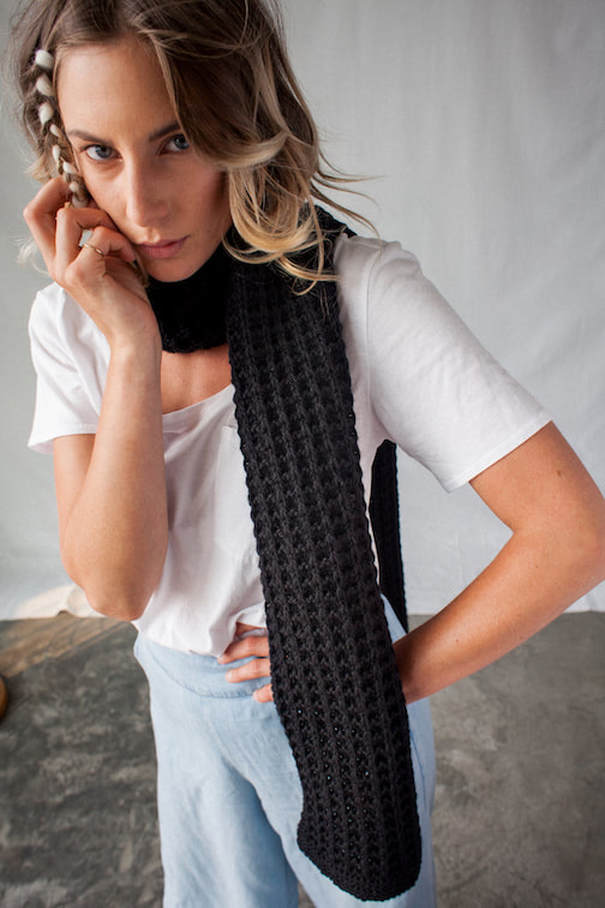 MENSCH is a hand knit highly textured wool scarf black