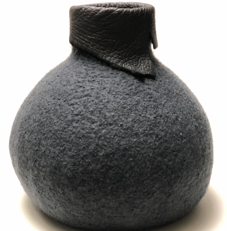 BOLA are oversized hand knit & hand fulled felt art vessels