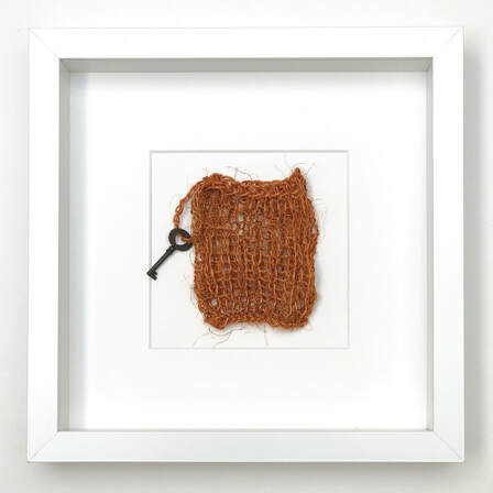 FRAMED - toffee coloured japanese fiqué knitted into a pouch with antique key hanging 9x9 zed handmade