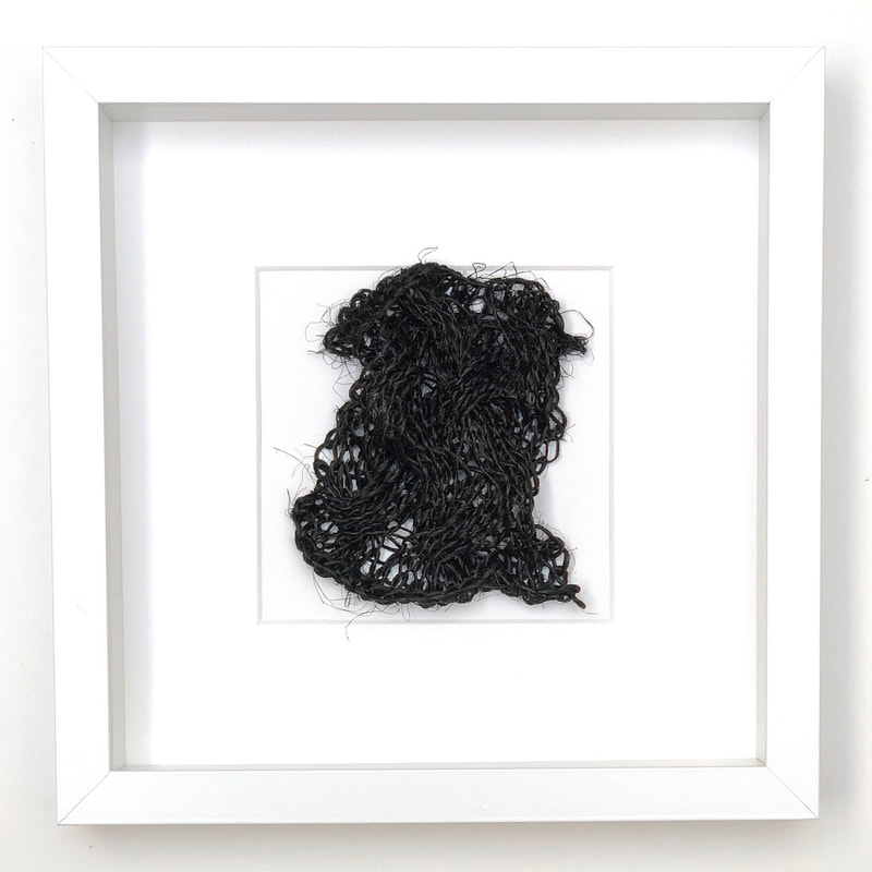 FRAMED - black japanese fiqué knitted into a cabled shape reminiscent of a feminine figure 9x9 zed handmade